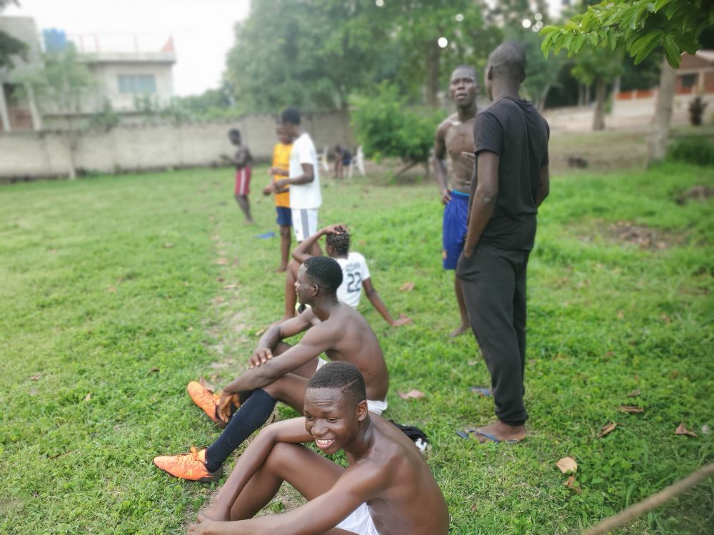Students relaxing after sports, at the end of the day